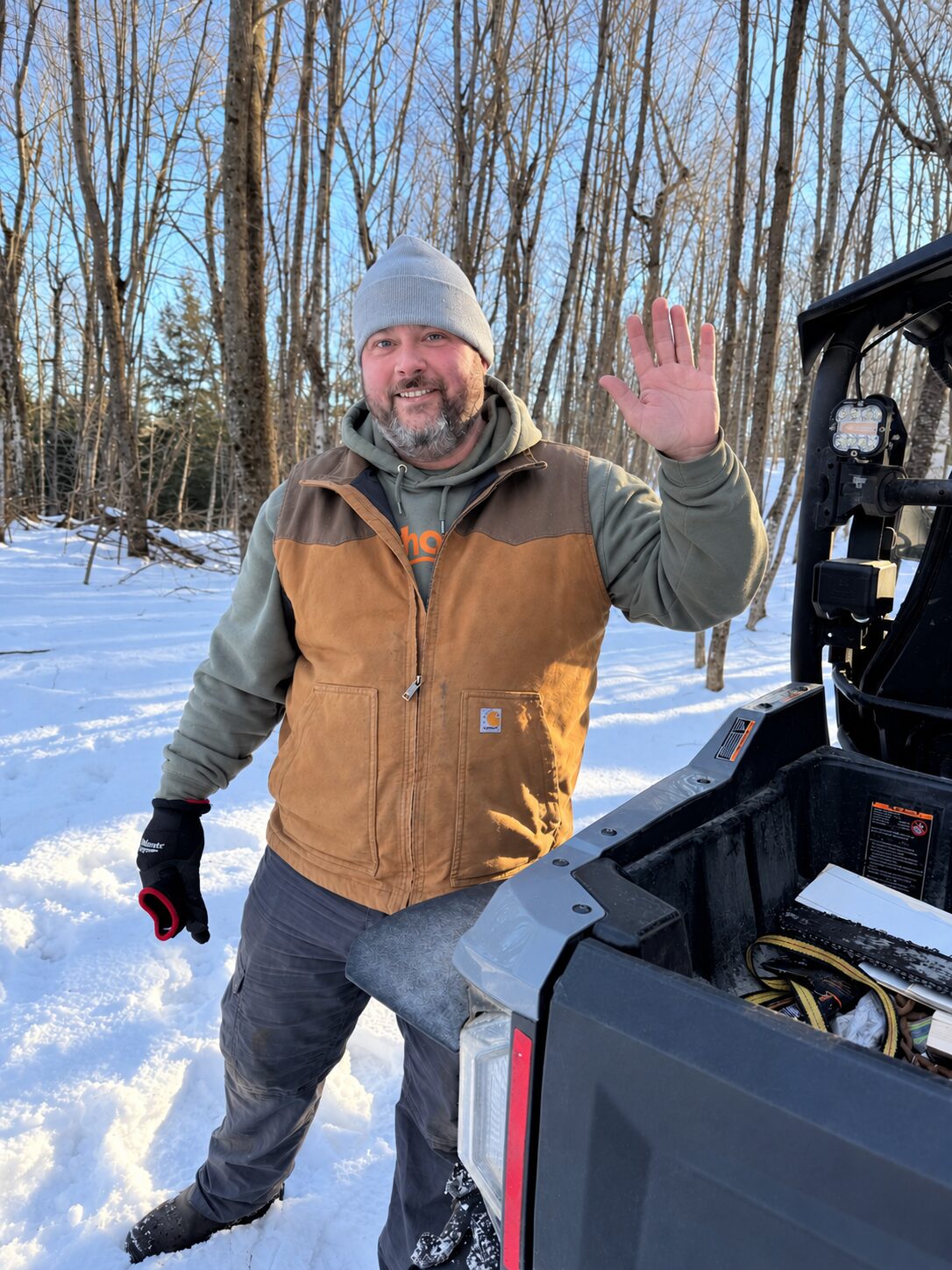 Ryan McMurrer waving in the winter woods of Ward 3, Lanark Highlands.